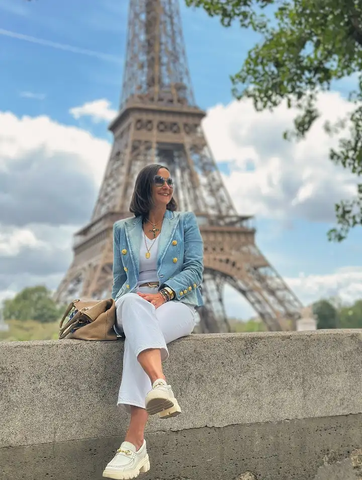 15 European Vacation Outfits for Women Over 40 12 Denim Blazer with White Jeans and Chunky Loafers