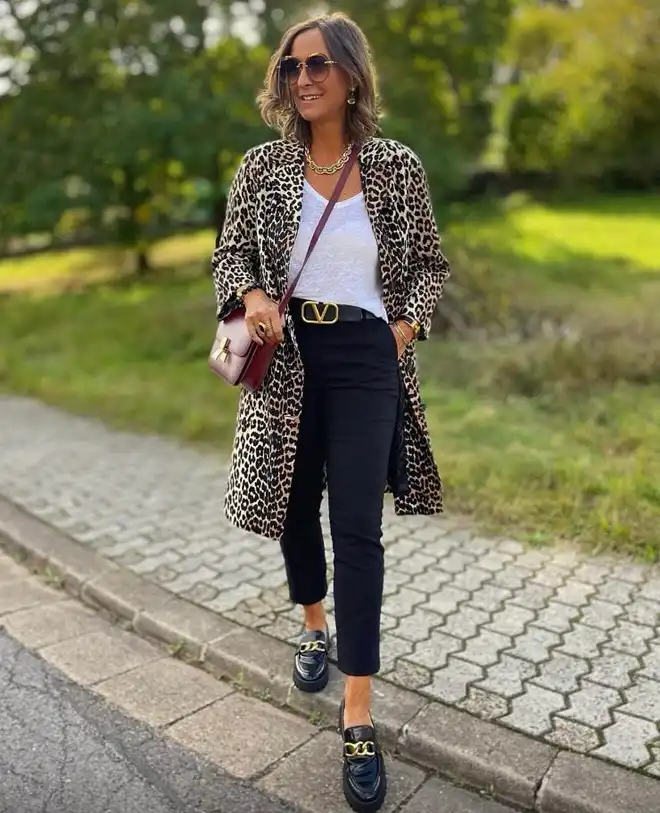 20 Classy Outfits for Women Over 40 15 Leopard Coat with Black Cropped Trousers