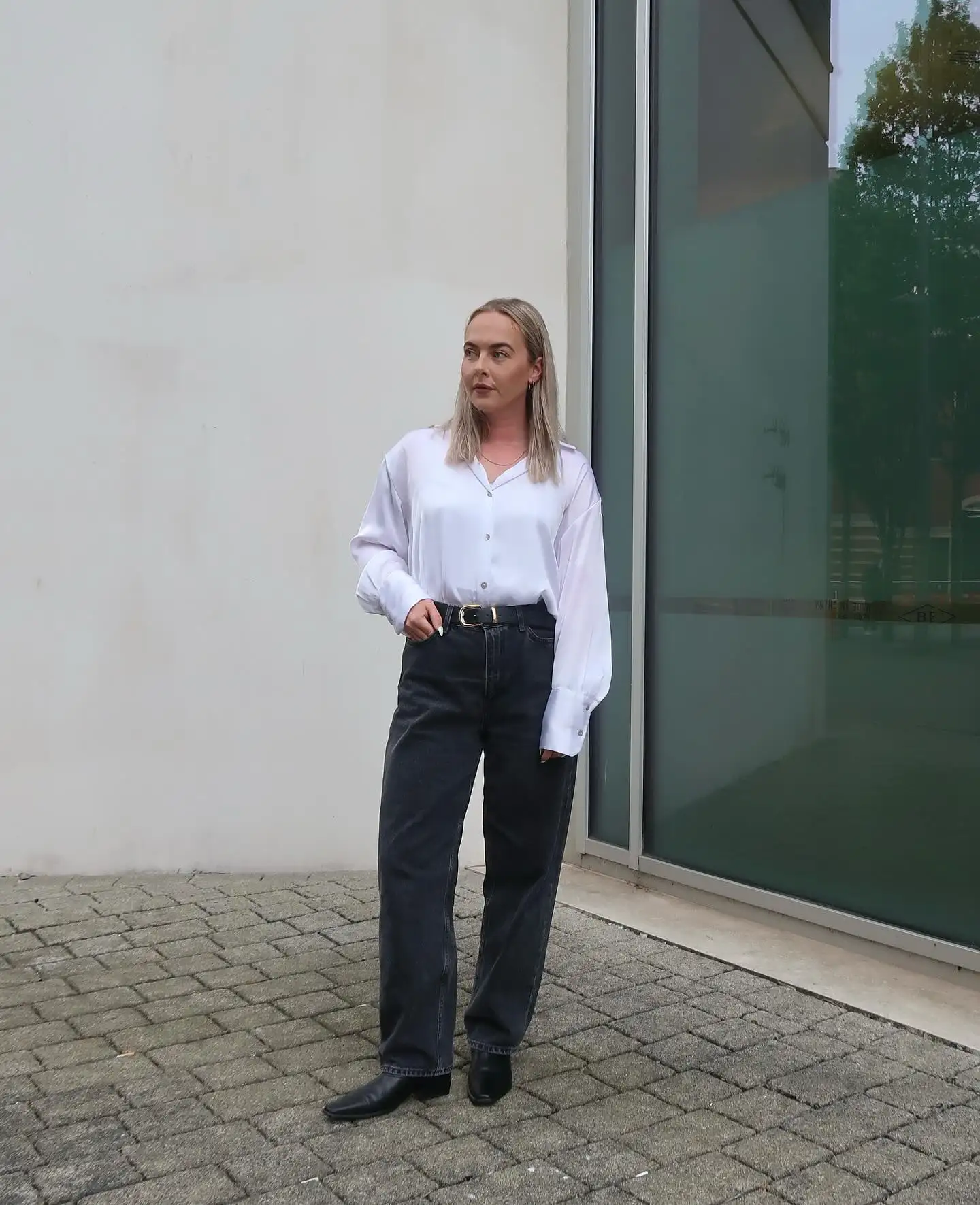 Fall Capsule Wardrobe for Women Over 40 (20 Pieces) 3 2. White Satin Blouse