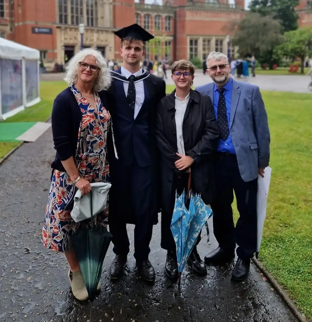 15 Outfits for the Mother of the Graduate Over 40 That Look Great in Every Photo 14 Floral Wrap Dress Ready for Rain