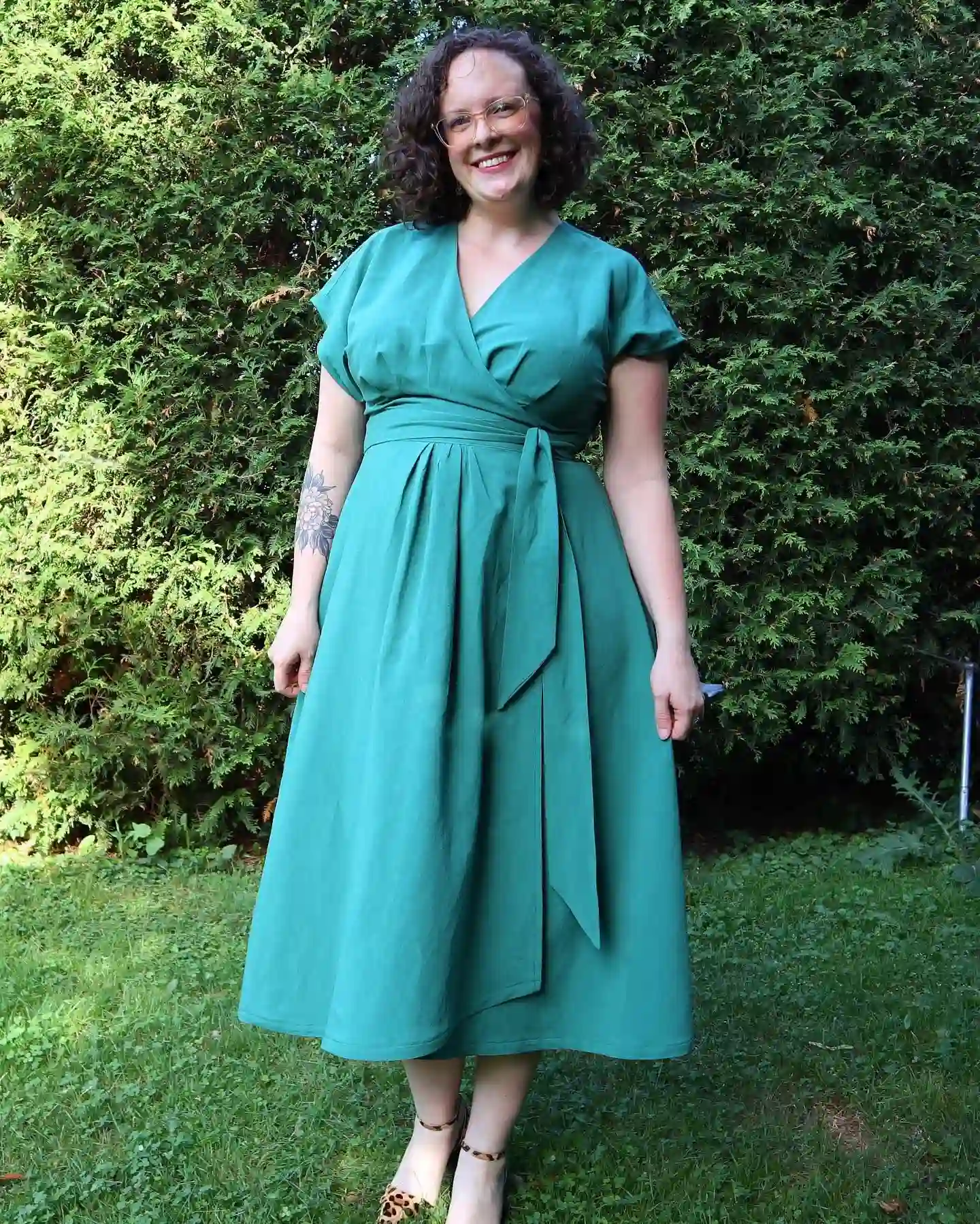 2. Emerald Wrap Dress With Leopard Shoes