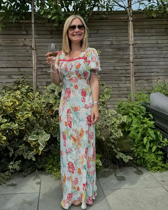 18 Retirement Party Outfits for Women Over 40 (Casual to Formal) 13 Pastel Floral Maxi for a Garden Party