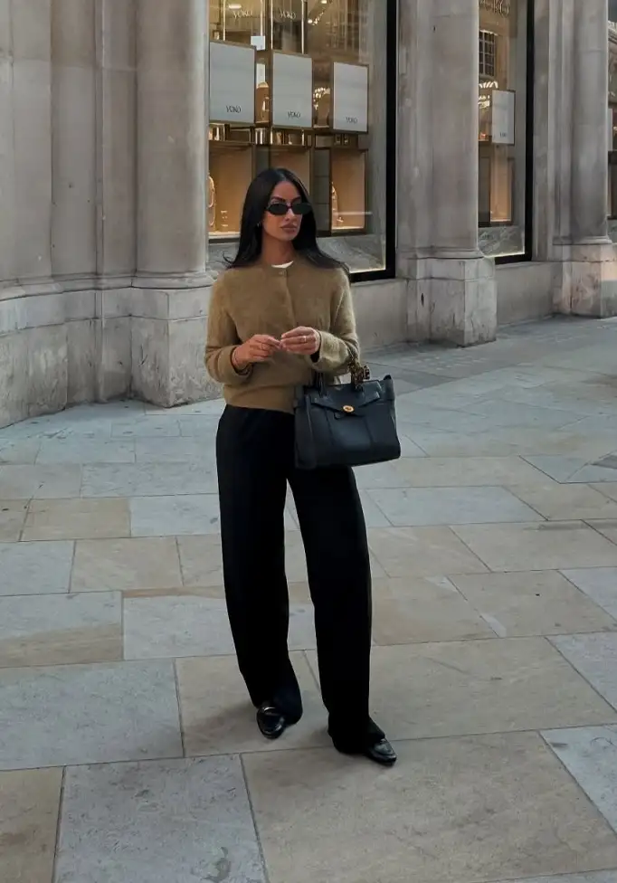18 Spring Work Outfits for Women Over 40 That Feel Fresh, Not Fussy 12 Olive Fuzzy Cardigan With Black Trousers and Loafers