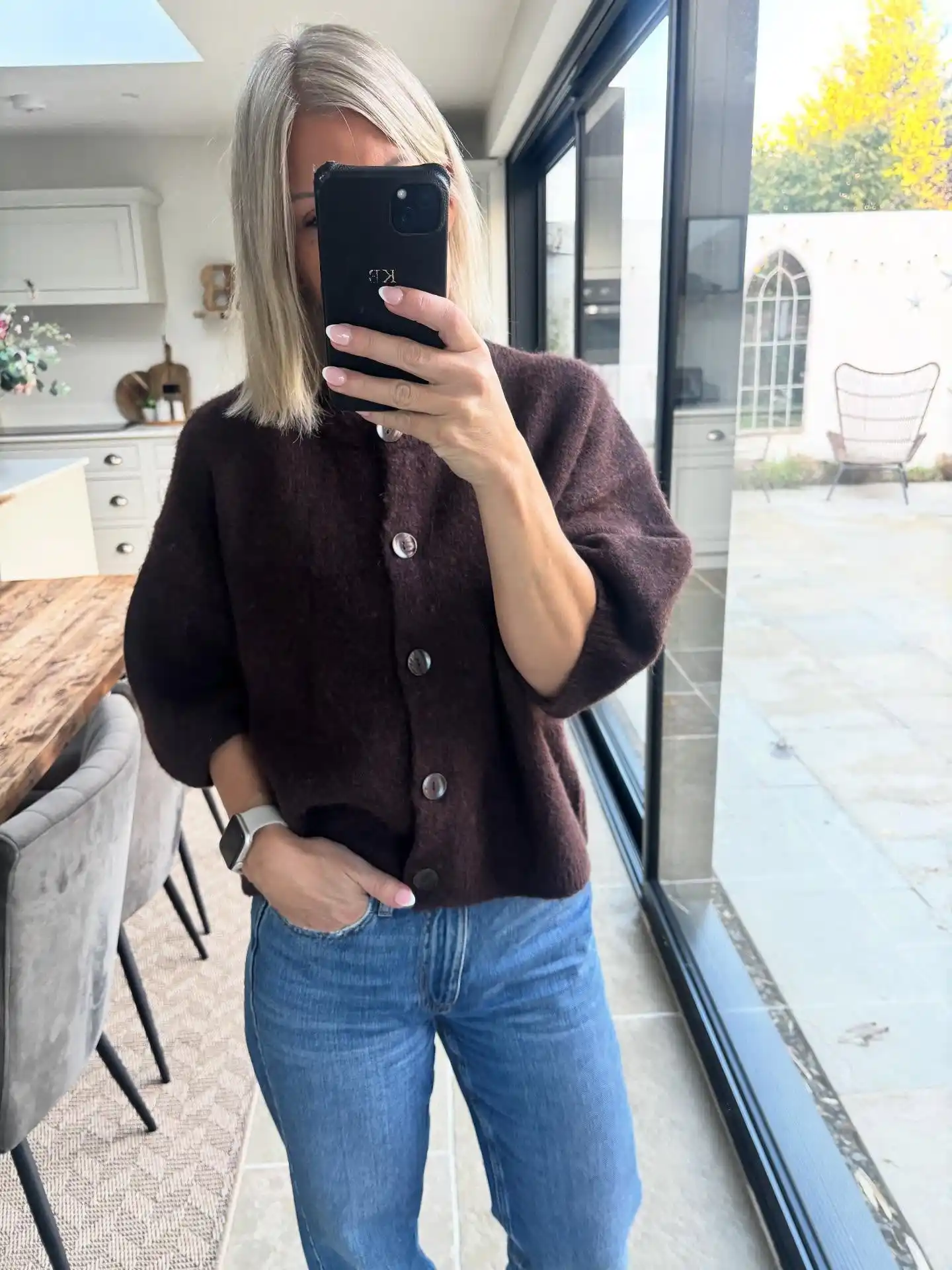 17 Fall Outfits Every Woman Over 40 Will Want to Copy 10 9. Boxy Cardigan and Straight Leg Denim