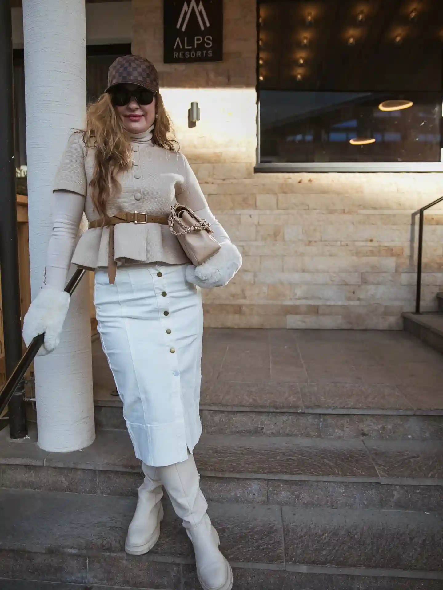 3. Beige Peplum Knit With a White Denim Midi Skirt and Tall Cream Boots