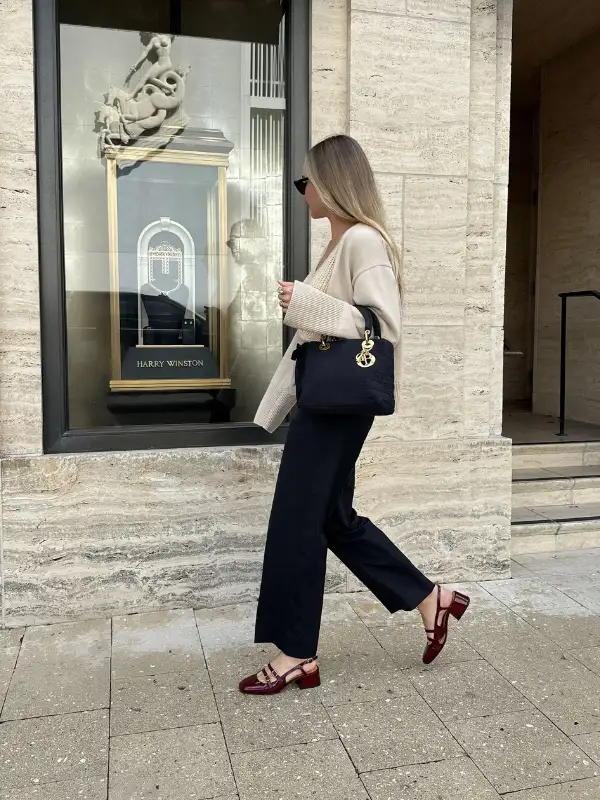 15 Fall Transitional Outfits for Women Over 40 (Summer-to-Fall) 4 3. Open Knit Cardigan Over Black Wide Leg Trousers
