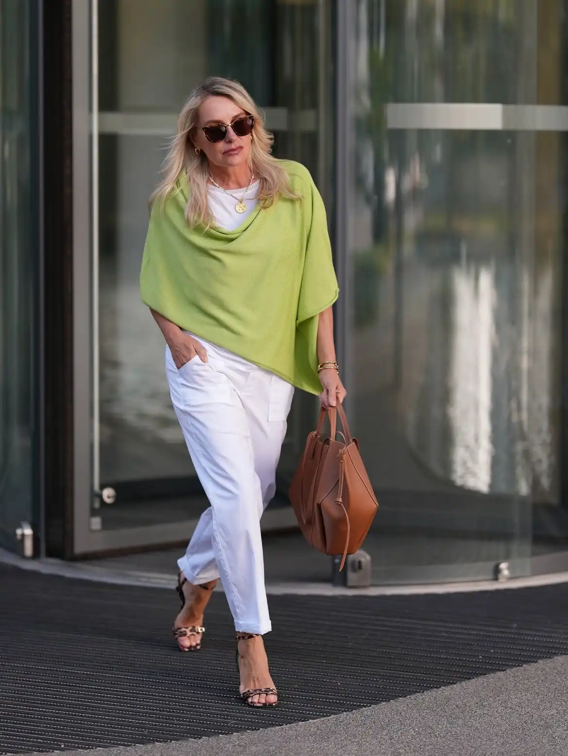 Modern Style: 20 Fall Outfits for Women Over 50 21 20. Green Poncho Top with White Trousers