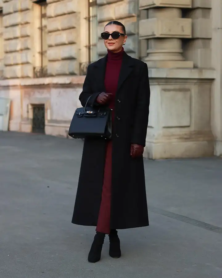 The Black Maxi Coat Over a Burgundy Column