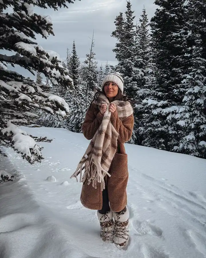 18 Winter 2026 Outfits for Women Over 40 2 A Long Teddy Coat and Plaid Blanket Scarf for Snowy Weekends