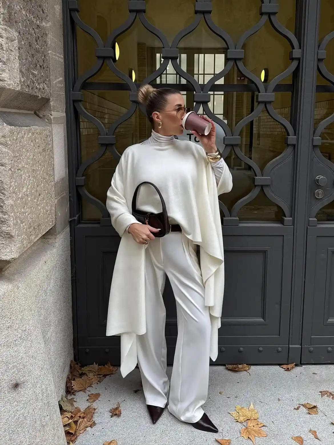 17 Fall Outfits Every Woman Over 40 Will Want to Copy 15 14. Draped Poncho and Wide Leg Trousers