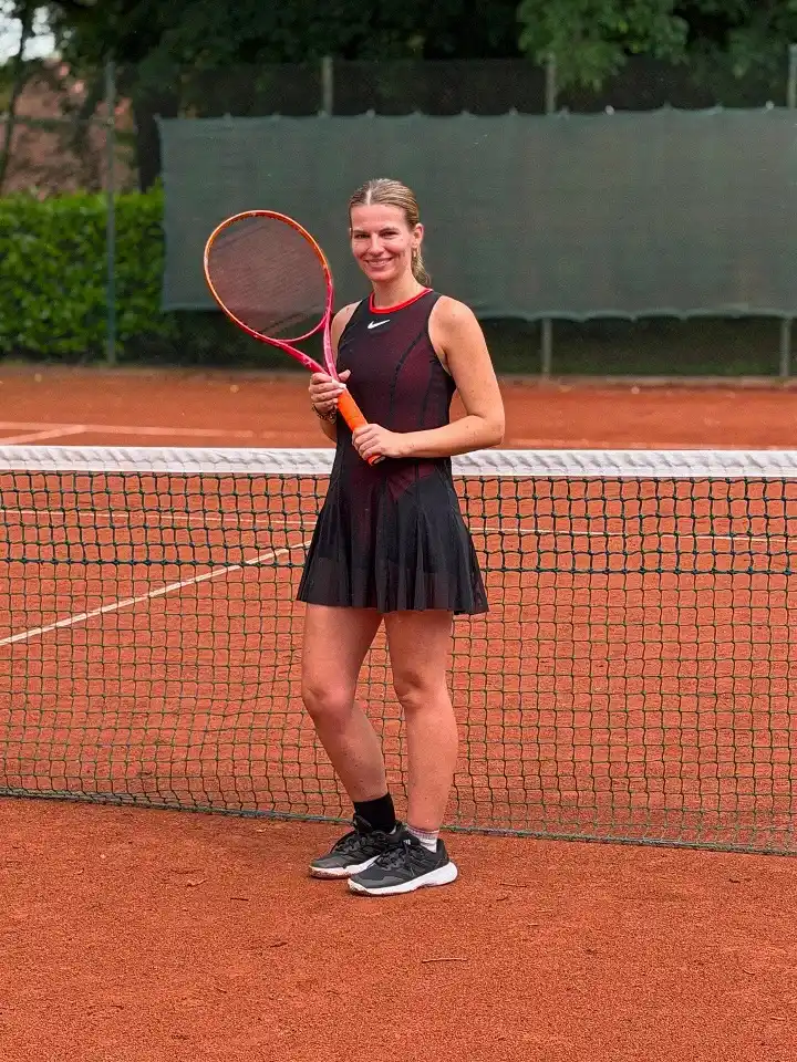 A Black Tennis Dress With a Sheer Overlay for Serious Match Days