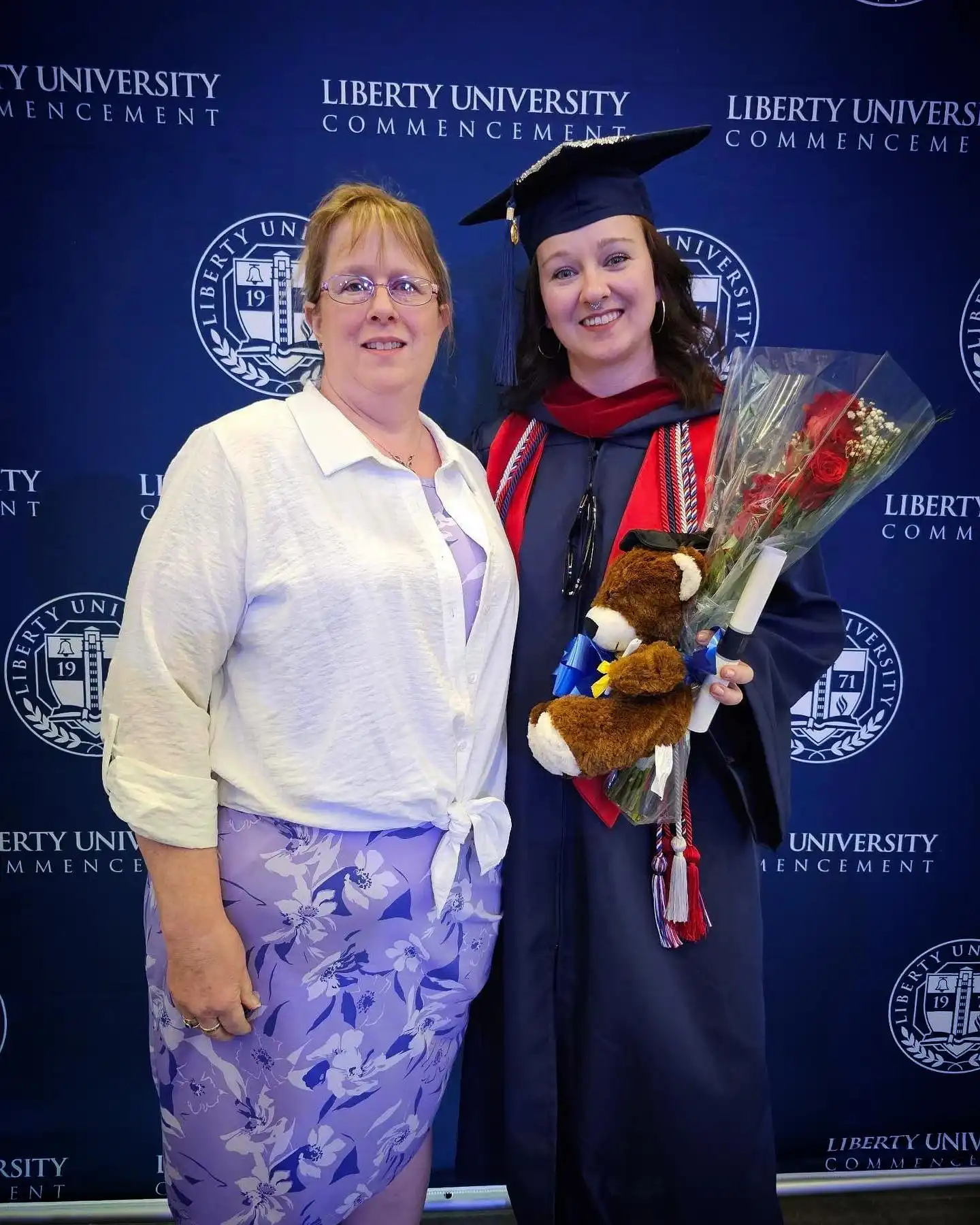 15 Outfits for the Mother of the Graduate Over 40 That Look Great in Every Photo 7 Tied White Shirt over a Lavender Floral Dress