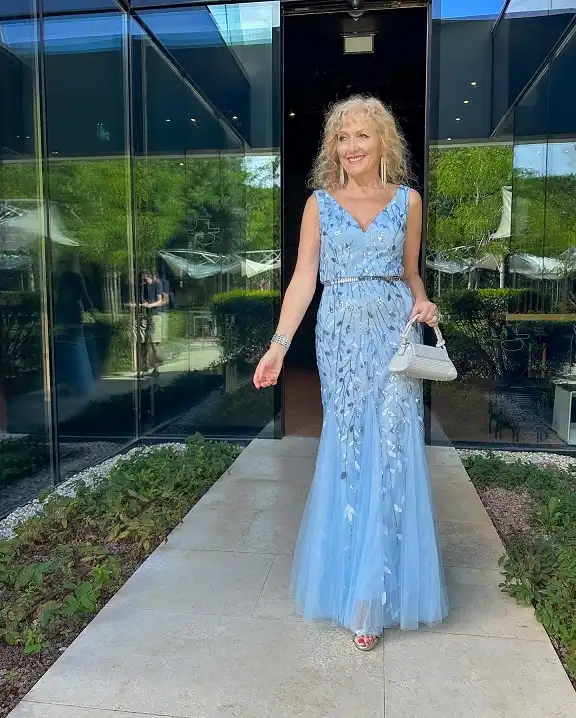 18 Retirement Party Outfits for Women Over 40 (Casual to Formal) 4 Light Blue Embellished Mermaid Gown