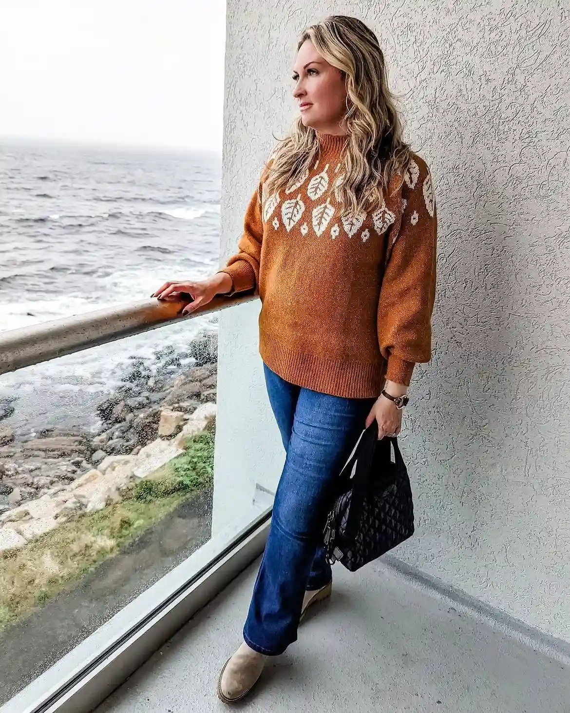 12. Leaf Print Sweater with Bootcut Jeans