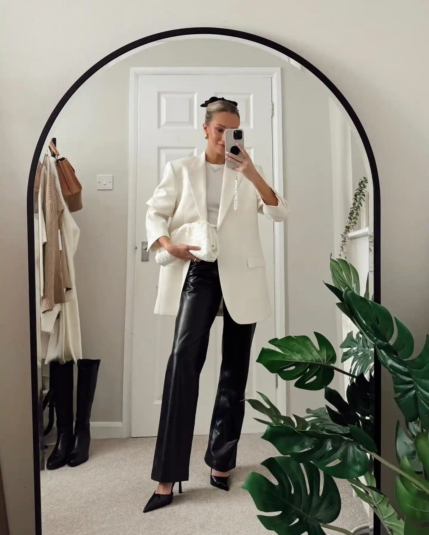 19 Holiday Outfits for Women Over 40 That Work for Parties, Dinners, and Sunny Trips 7 6. Cream Blazer With Black Leather Look Pants