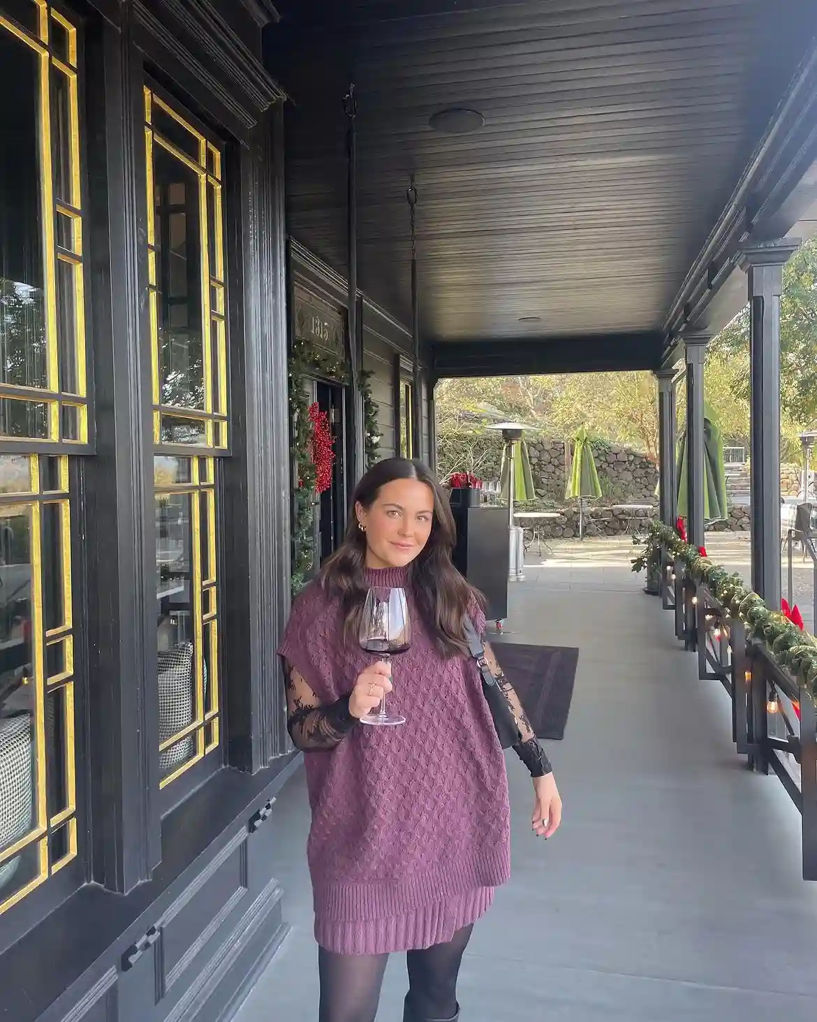 19 Winter Vacation Outfits Over 40 (Warm Getaways) 10 9. Plum Sweater Dress With Lace Sleeves and Tights