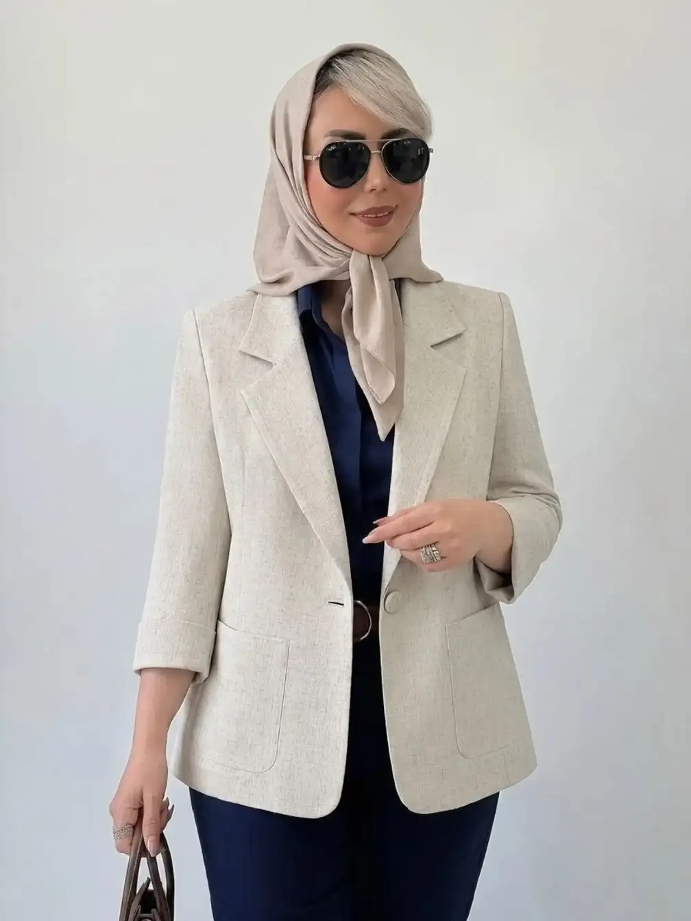A Textured Oatmeal Blazer Over Navy, Finished With a Silk Headscarf