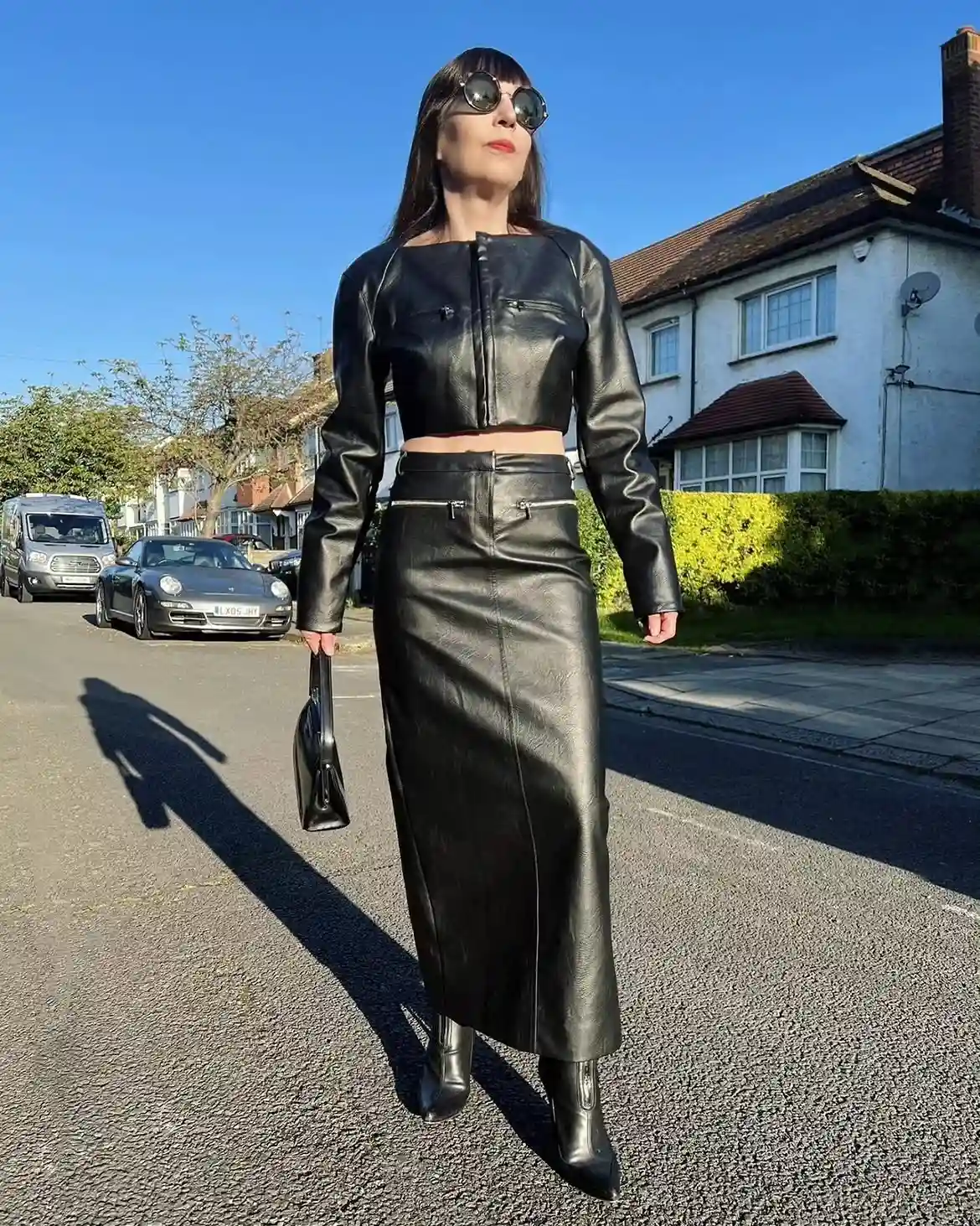 17 Leather Outfits Over 40 (Not Costumey) 2 1. Cropped Leather Jacket with Maxi Skirt