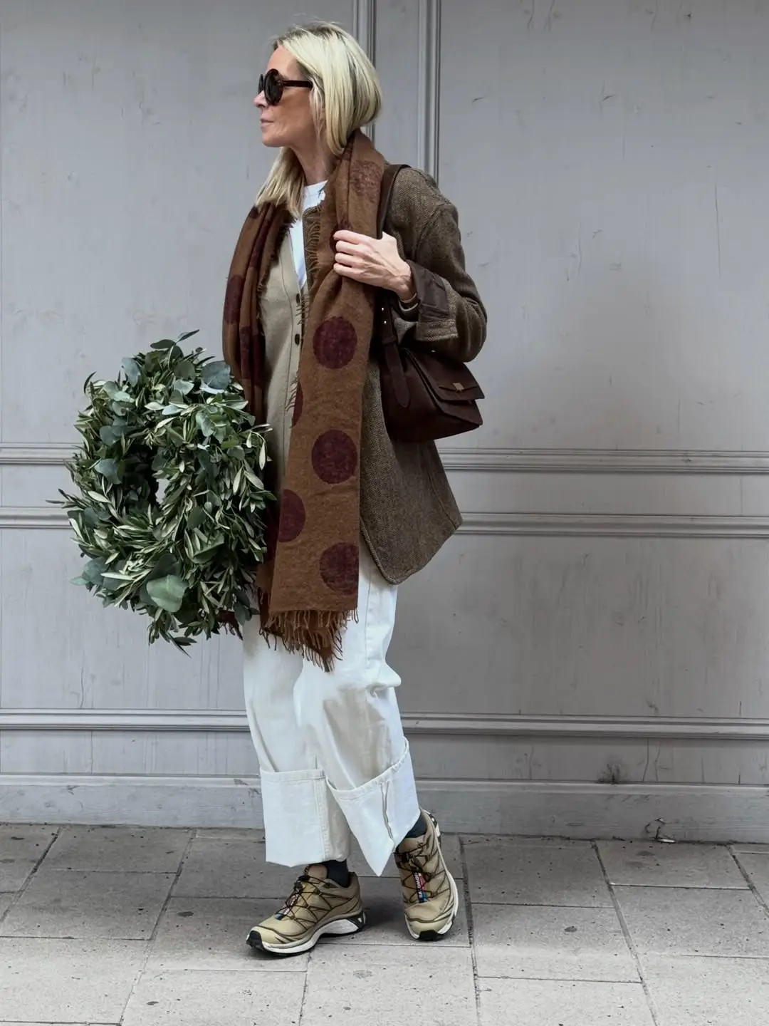 15 Cashmere Outfits for Women Over 40 That Feel Cozy and Polished 9 8. Long Dotted Scarf Over a Beige Cardigan and Cuffed Cream Pants
