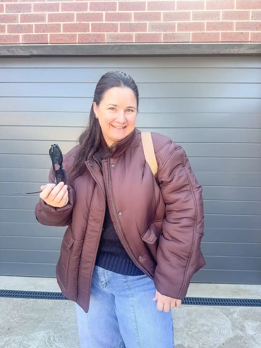 15 Puffer Jacket Outfits for Women Over 40 That Actually Look Chic 3 2. Swap Basic Black for a Deep Burgundy Puffer