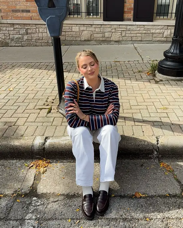 18 Preppy Outfits for Women Over 40 6 Rugby Stripe Shirt With White Jeans and Loafers