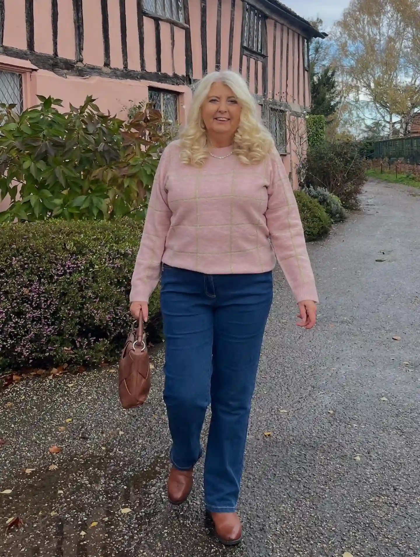 7. Dusty Rose Sweater with Bootcut Jeans