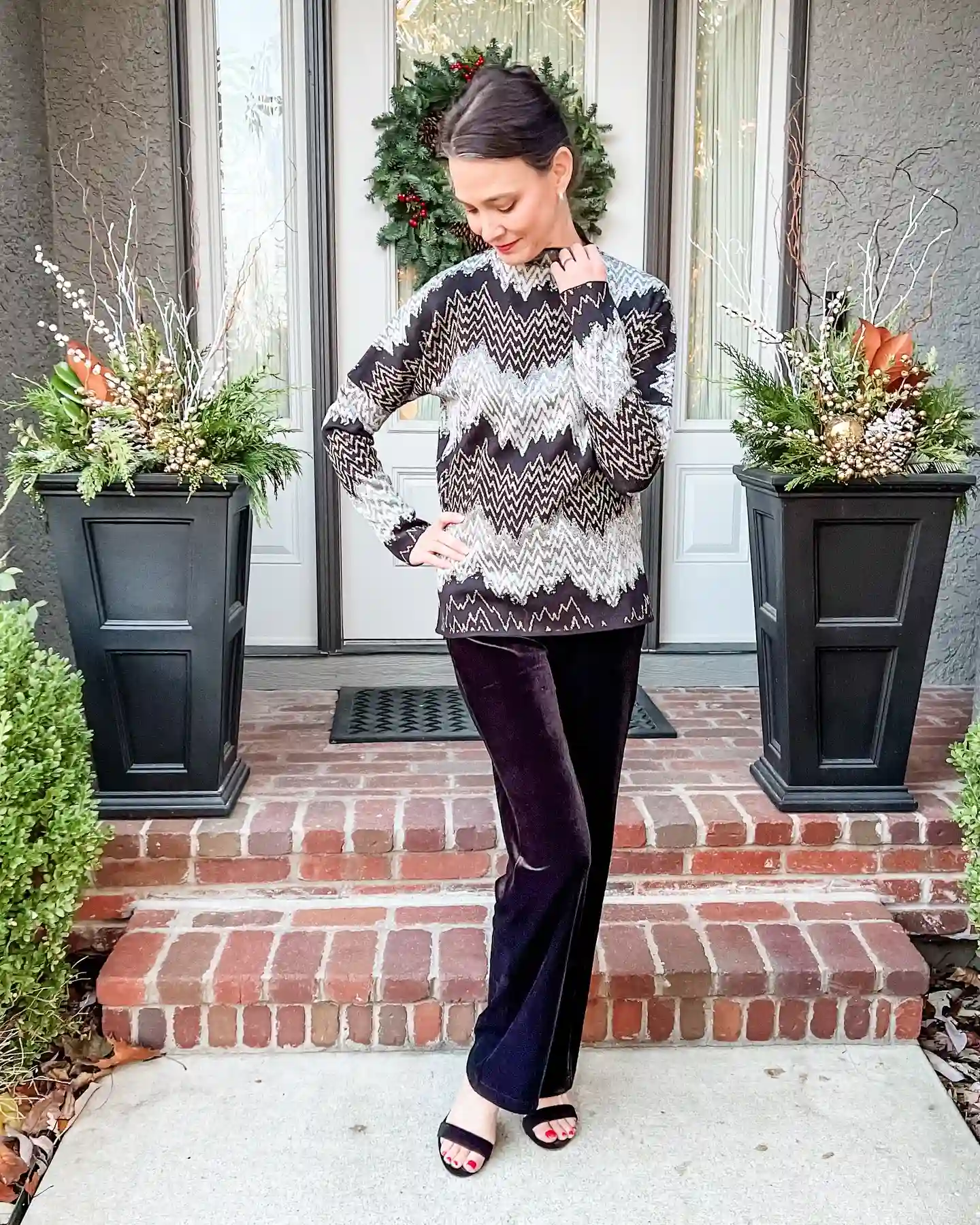 15 Velvet Outfits for Women Over 40 to Wear All Season 2 1. Dark Velvet Pants With a Metallic Chevron Sweater