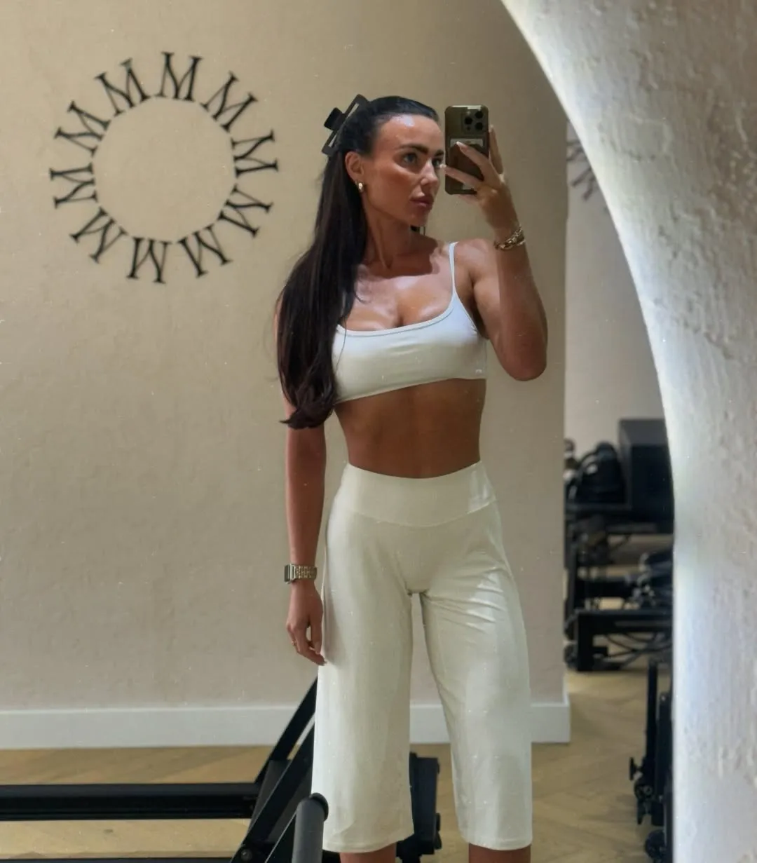 Pilates Outfits for Women Over 40: 10 Looks That Stay Put 5 4. Cropped Bra Top and Cropped Flare Pants