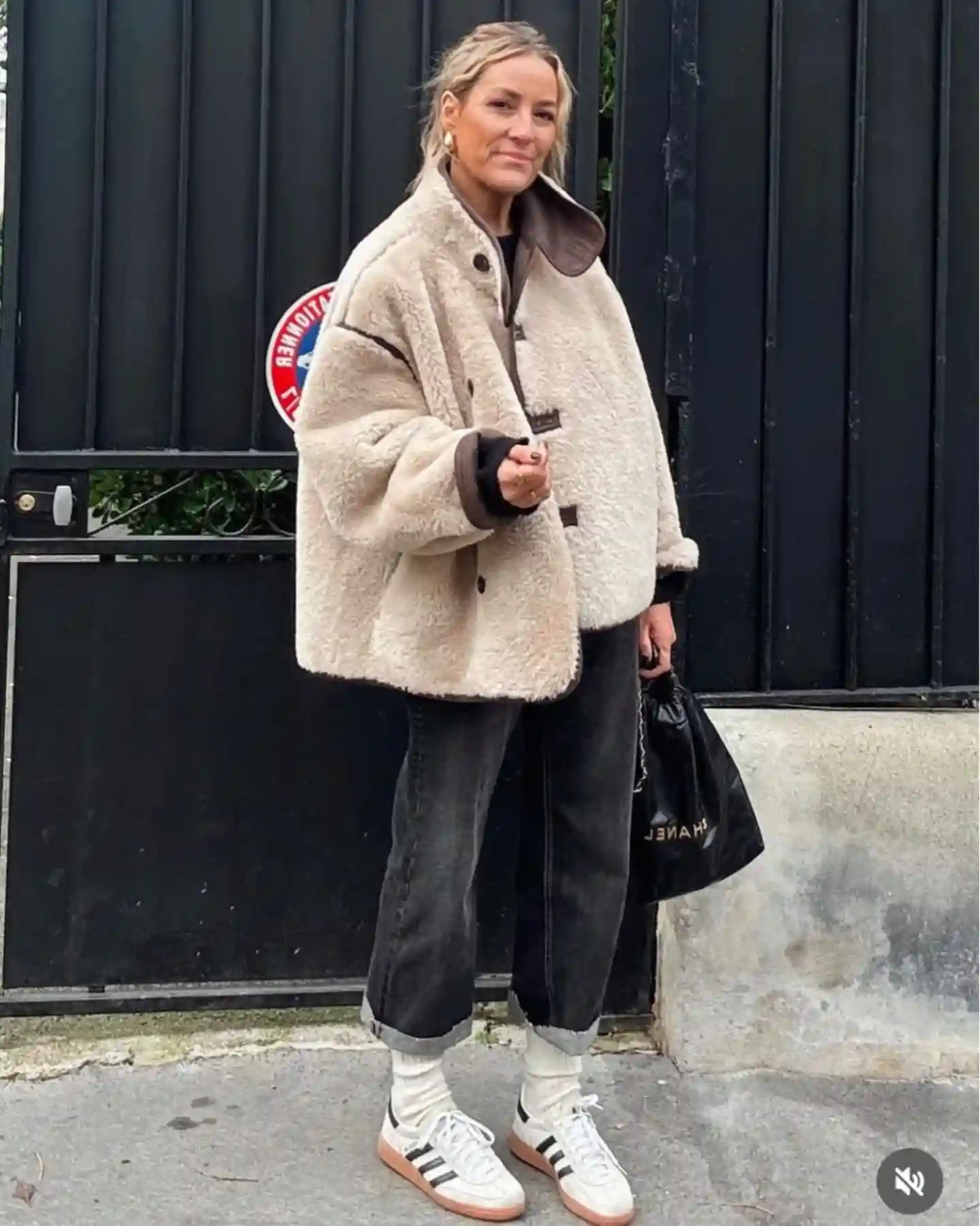11. Cream Teddy Jacket with Black Jeans and Cozy Socks
