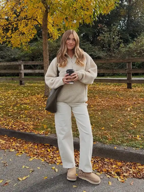 15 Fall Transitional Outfits for Women Over 40 (Summer-to-Fall) 9 8. Cream Sherpa Half Zip With Winter White Denim