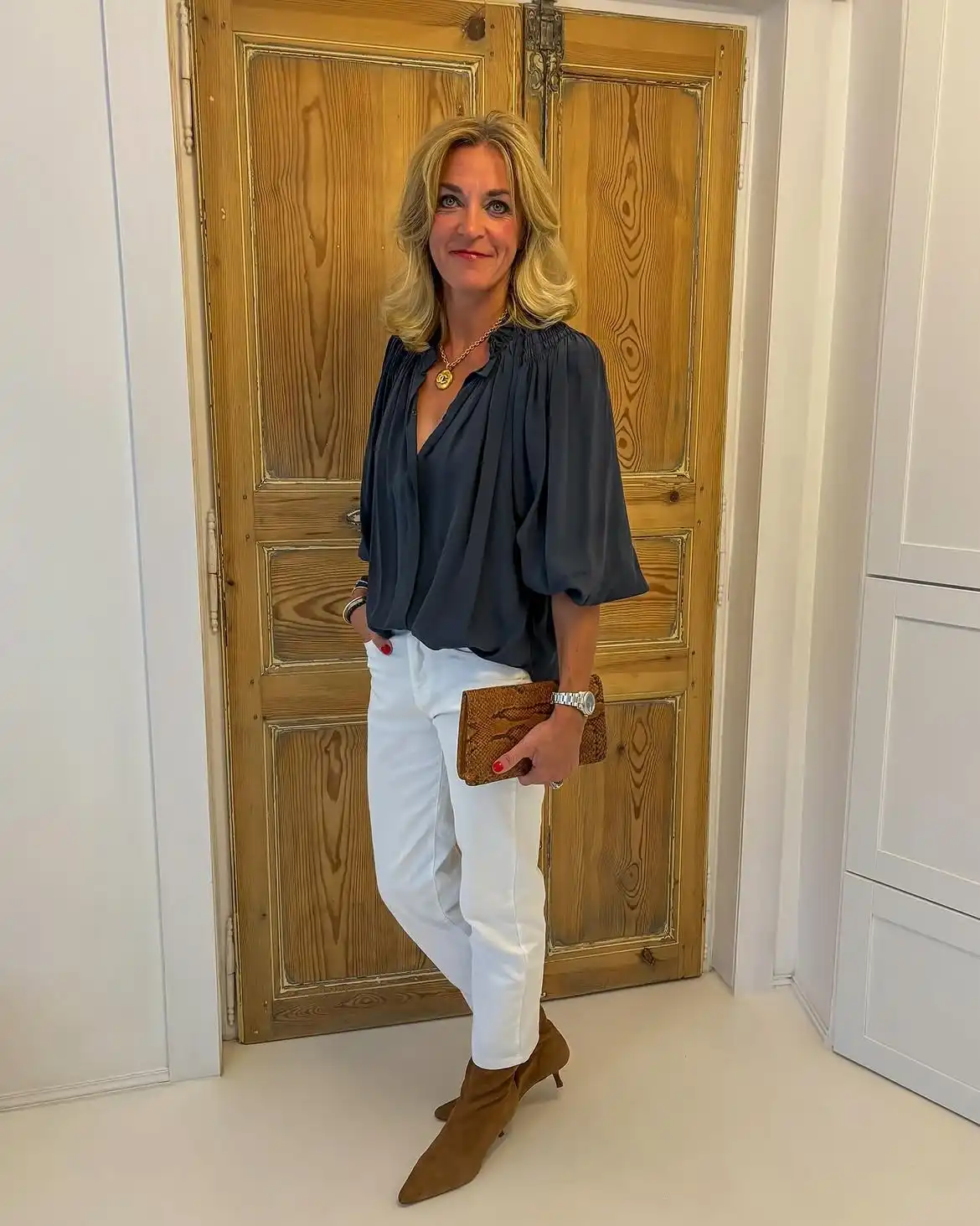 Modern Style: 20 Fall Outfits for Women Over 50 19 18. Charcoal Blouse with White Cropped Jeans