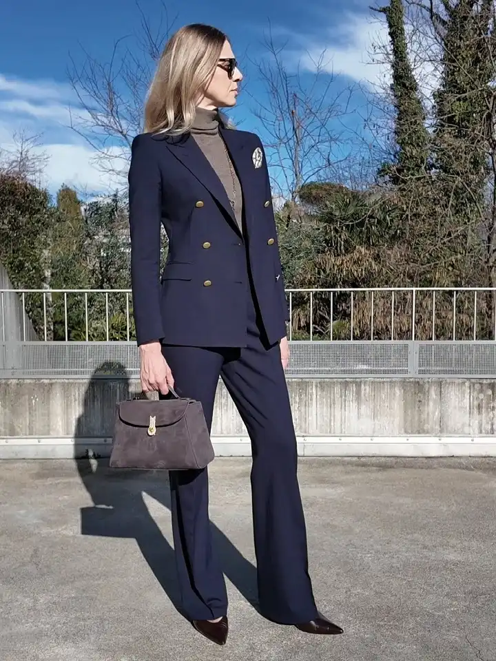 17 Old Money Outfits for Women Over 40 That Look Rich Without Trying 16 A Navy Double Breasted Suit With a Taupe Turtleneck