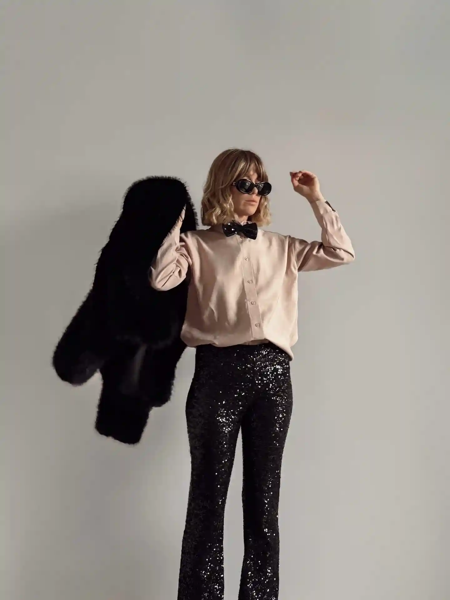 13. Sequin Flares with a Blush Shirt and Sparkly Bow Tie