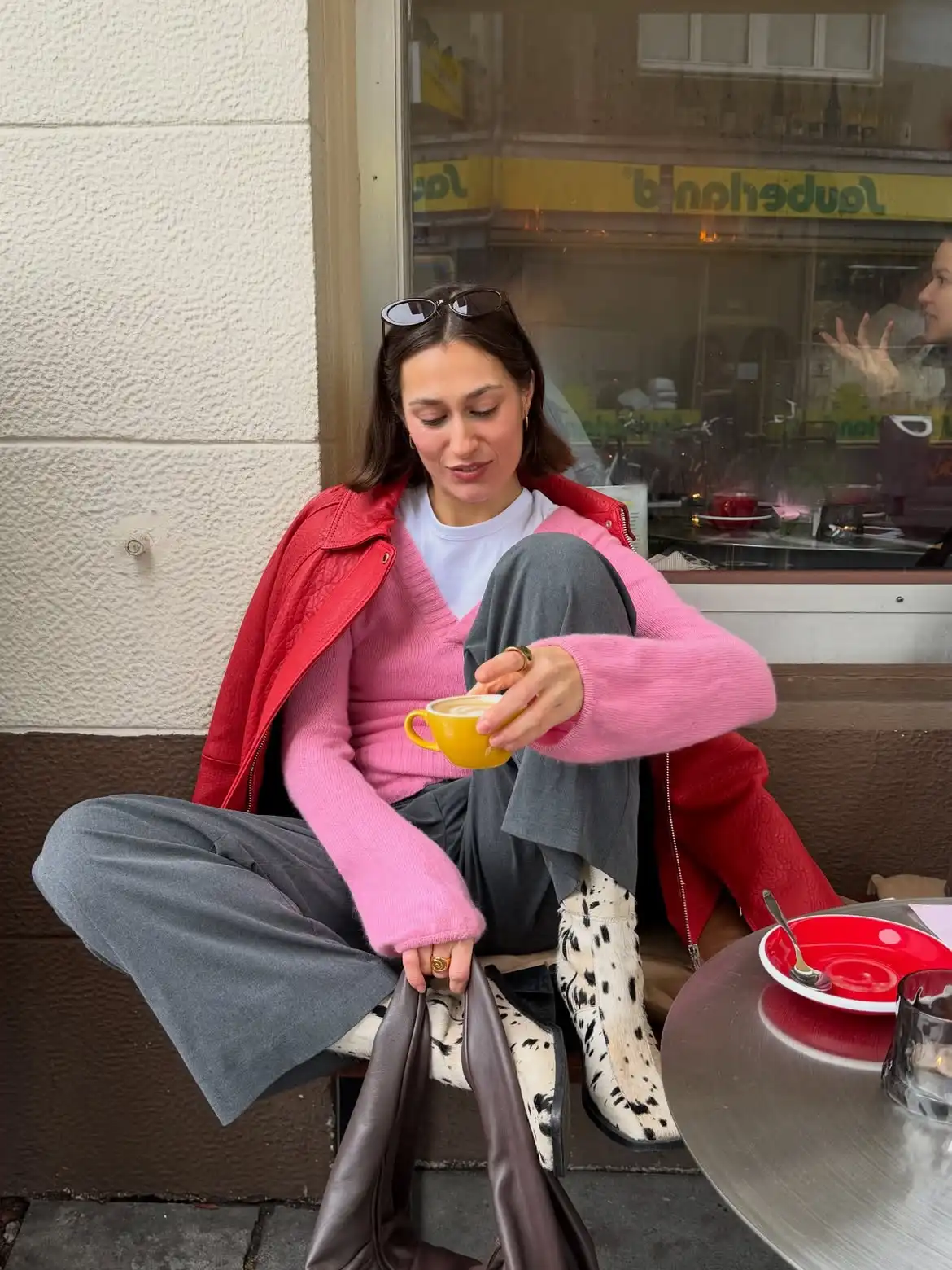17 Fall Outfits Every Woman Over 40 Will Want to Copy 16 15. Pink Sweater and Cow Print Boots