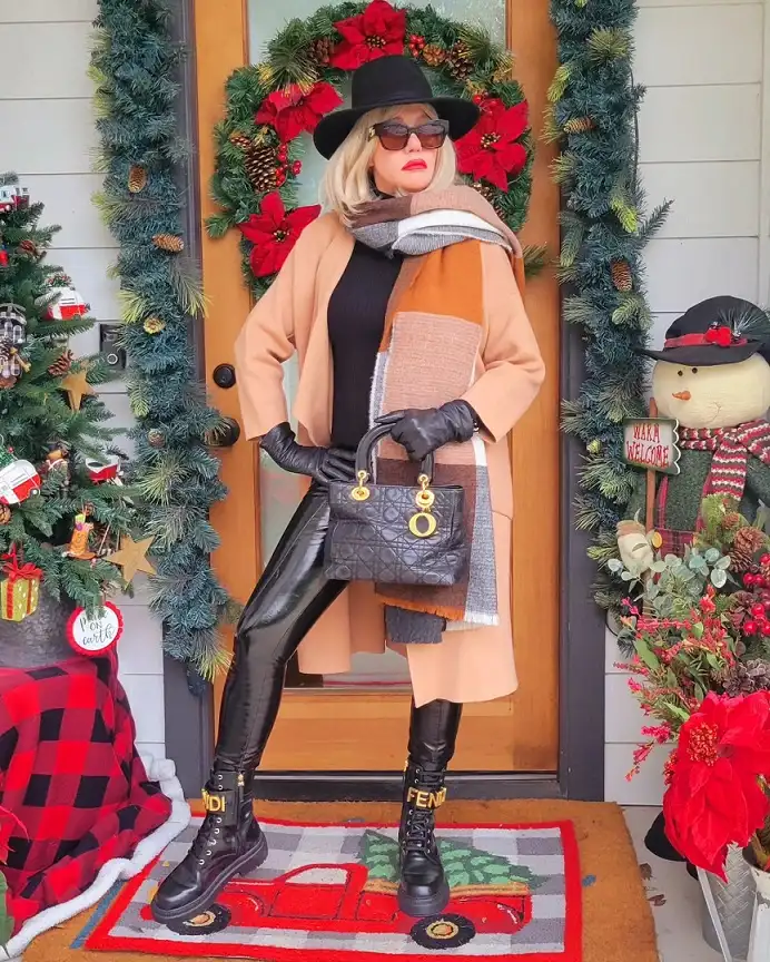 20 Chic Winter Outfits for Women Over 40 That Aren't Frumpy 12 Camel Coat and Blanket Scarf for the Holidays