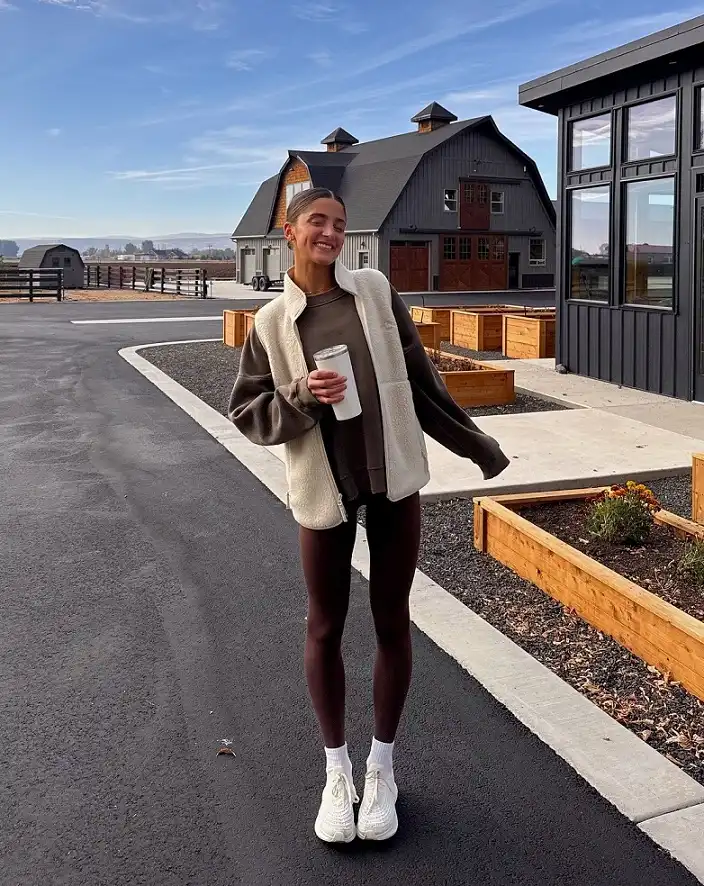 Sherpa Vest Over a Brown Sweatshirt and Leggings