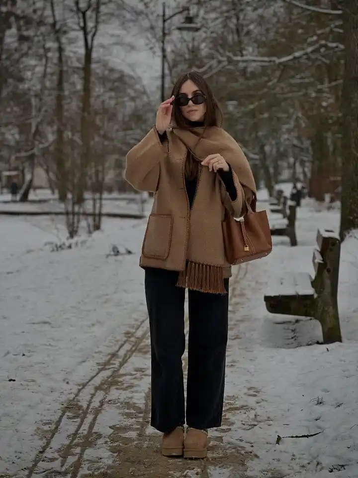 18 Winter 2026 Outfits for Women Over 40 17 A Camel Scarf Jacket With Dark Wide-Leg Jeans for Easy Winter Walks