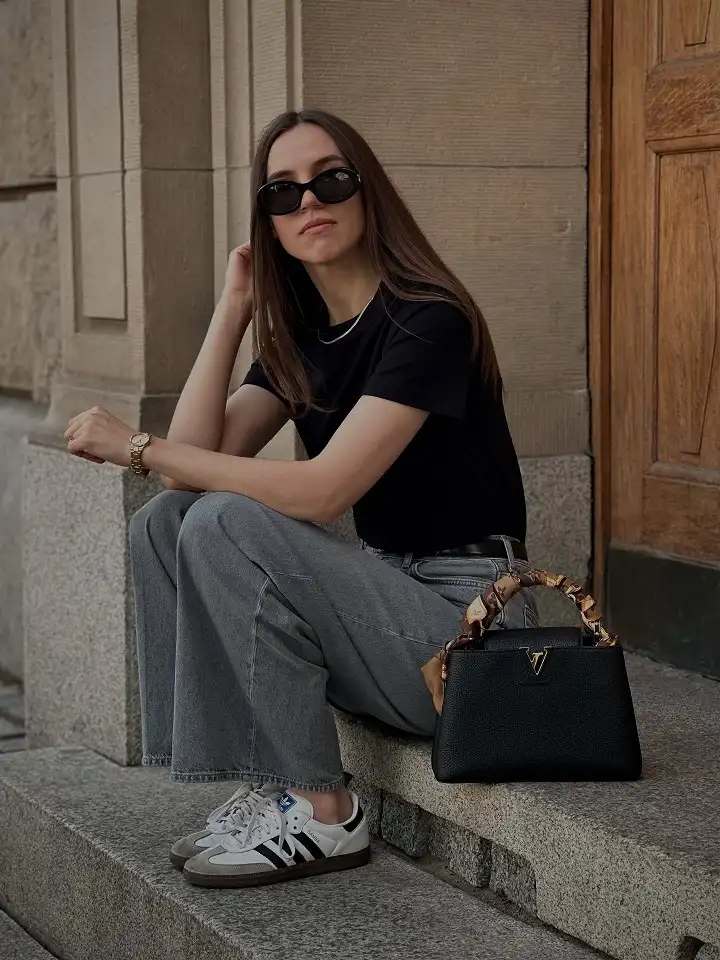 Black Tee, Gray Wide Leg Jeans, and Retro Sneakers