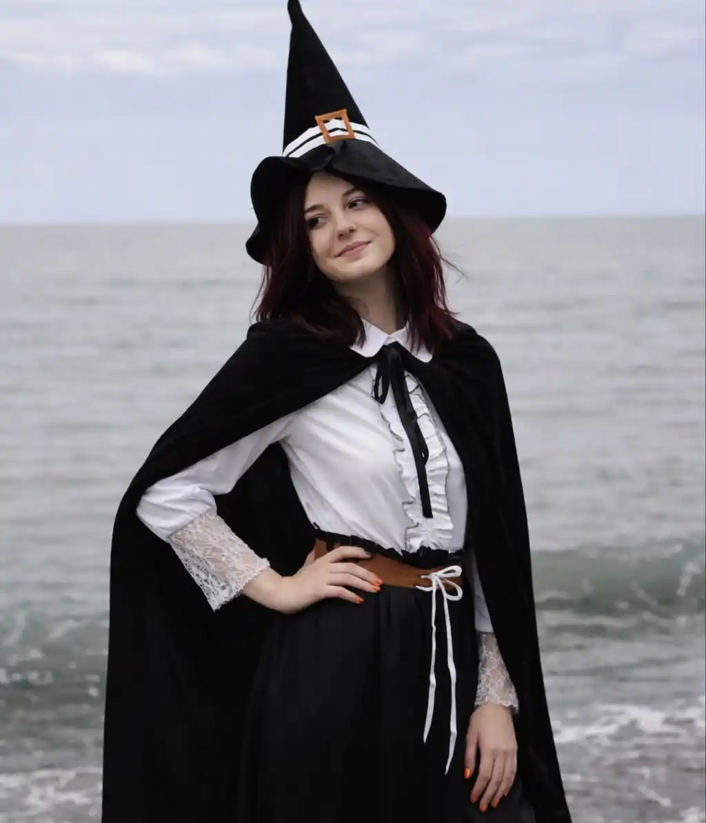 The Storybook Witch With a Velvet Cape and Lace Cuffs