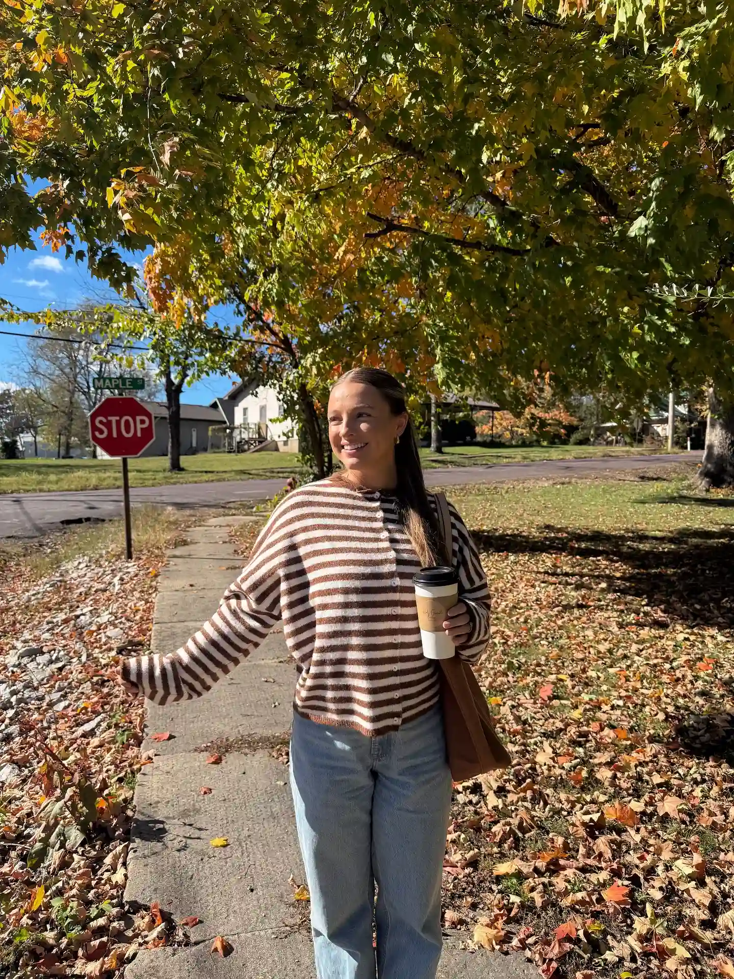17 Fall Outfits Every Woman Over 40 Will Want to Copy 8 7. Striped Cardigan and Wide Leg Jeans