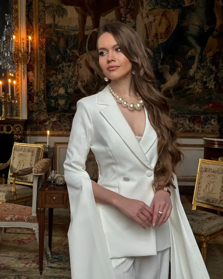 20 Quiet Luxury Outfits for Women Over 40 (Old Money Style, Real-Life Ready) 6 White Satin Blazer With Cape Sleeves for Evening