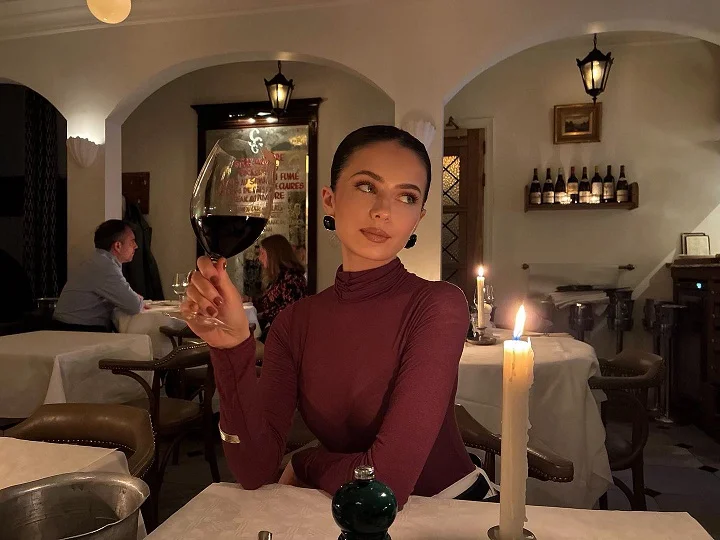 15 Fall Date Night Outfits Over 40 That Look Expensive Without Trying 10 9. The Fitted Burgundy Turtleneck, Nothing Else Needed