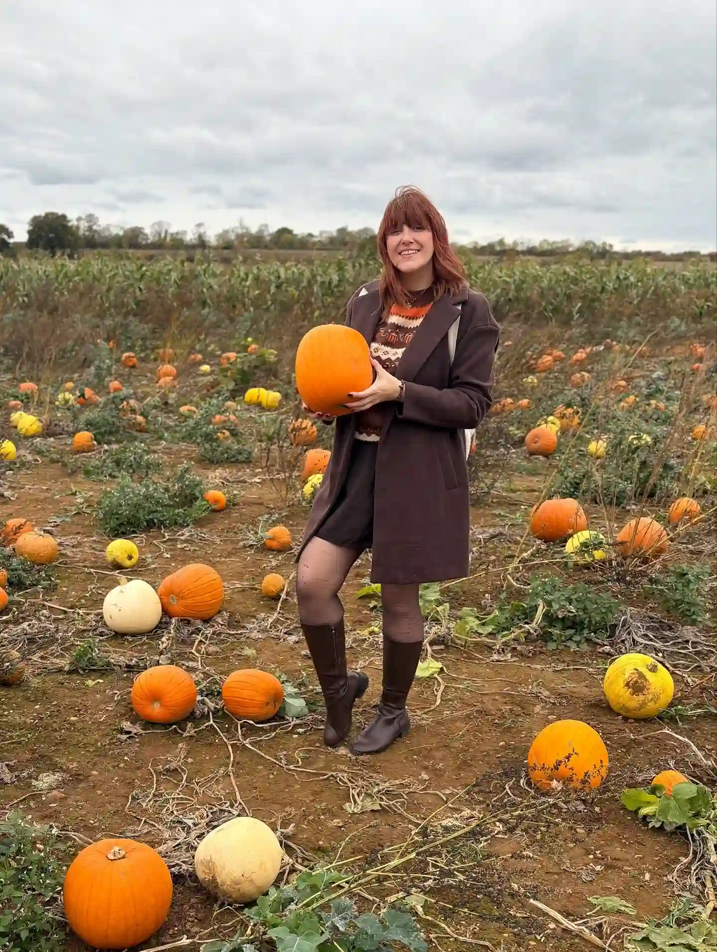 16 Pumpkin Patch Outfits Over 40 That Handle Mud, Hay, and Photos 17 9. Wool Coat With A Fair Isle Sweater