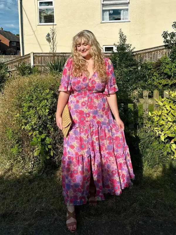 17 Fall Wedding Guest Dresses Over 40 That Look Expensive 14 13. Pink and Lilac Daisy Print Tiered Maxi