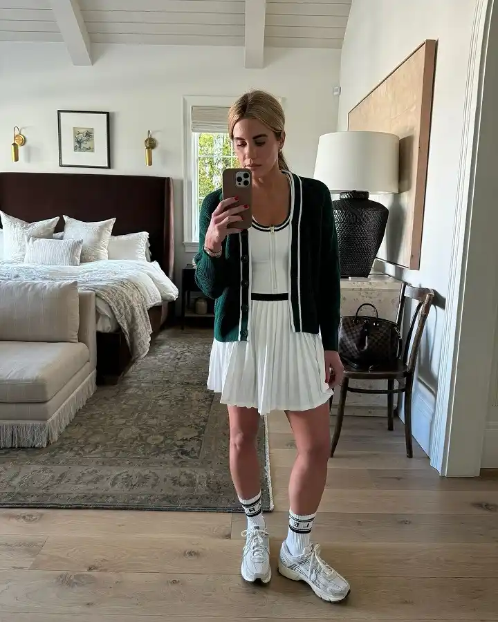 A White Tennis Dress Layered Under a Green Cardigan