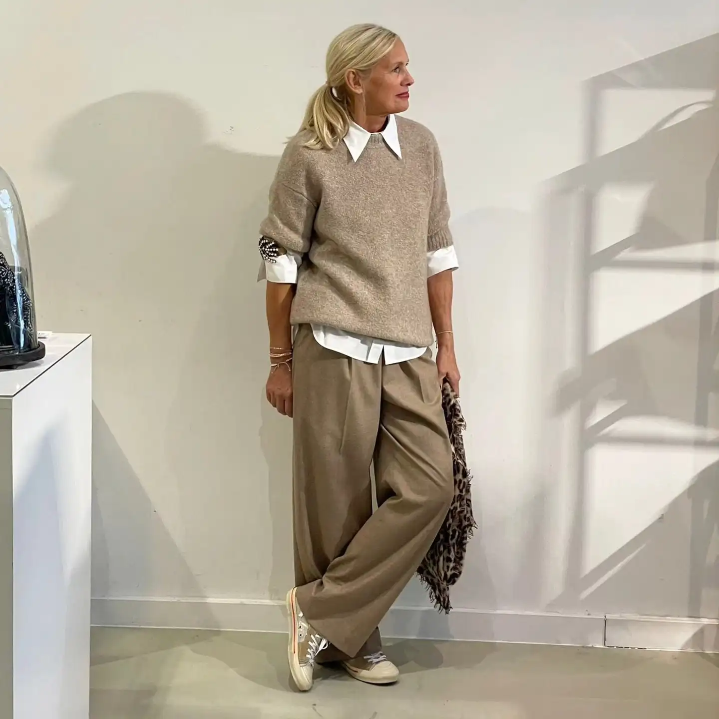 15 Cashmere Outfits for Women Over 40 That Feel Cozy and Polished 3 2. Oatmeal Knit Over a Crisp White Shirt With Matching Trousers