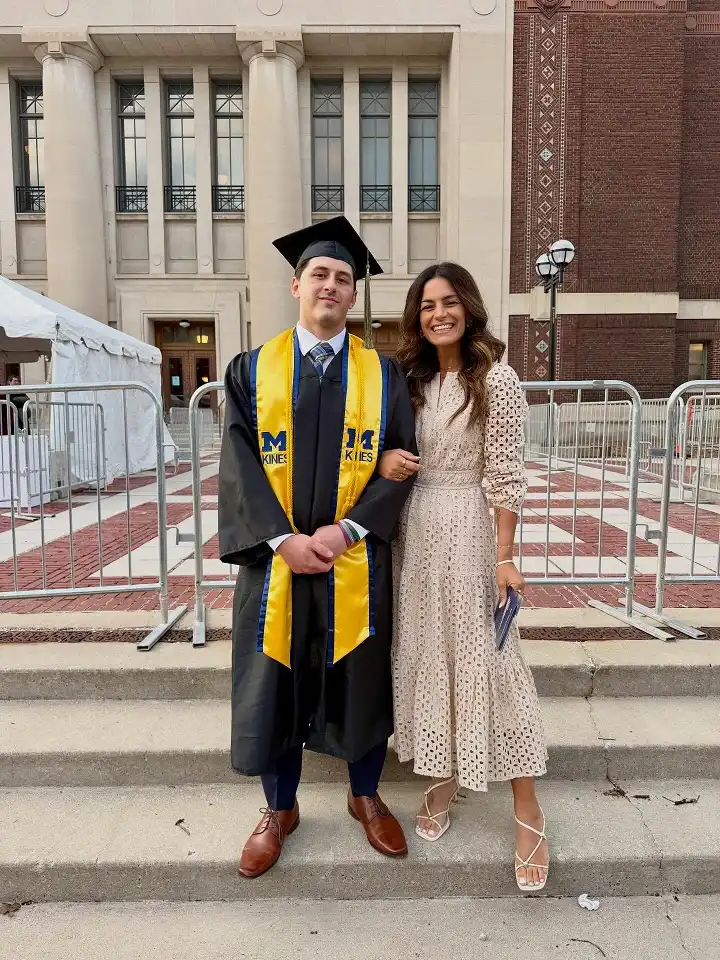 15 Outfits for the Mother of the Graduate Over 40 That Look Great in Every Photo 2 Cream Eyelet Midi Dress with Puff Sleeves