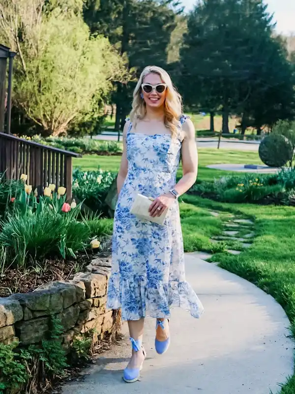 17 Fall Wedding Guest Dresses Over 40 That Look Expensive 4 3. Blue and White Floral Midi With Tie Straps