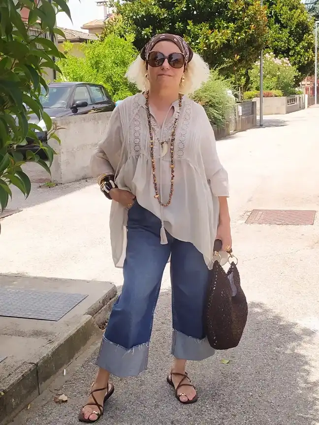 18 Boho Outfits for Women Over 40 (Not Costume-y) 6 Sheer Peasant Blouse with Cuffed Wide Jeans