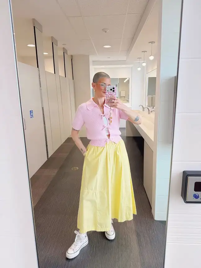 18 Spring Work Outfits for Women Over 40 That Feel Fresh, Not Fussy 17 Pink Bow Cardigan and Yellow Midi Skirt